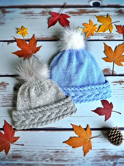 Cable knit bobble beanie free knitting pattern laid flat showing textured stitches