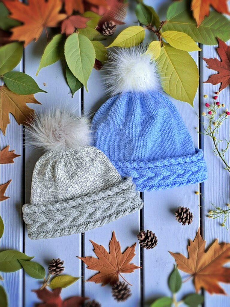 Hand knit cable beanie free knitting pattern laid flat winter hat with folded brim