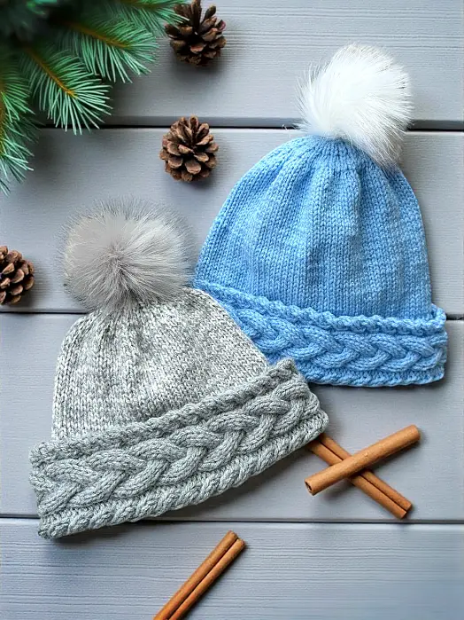 Cozy cable bobble beanie free knitting pattern finished hat laid flat with double brim