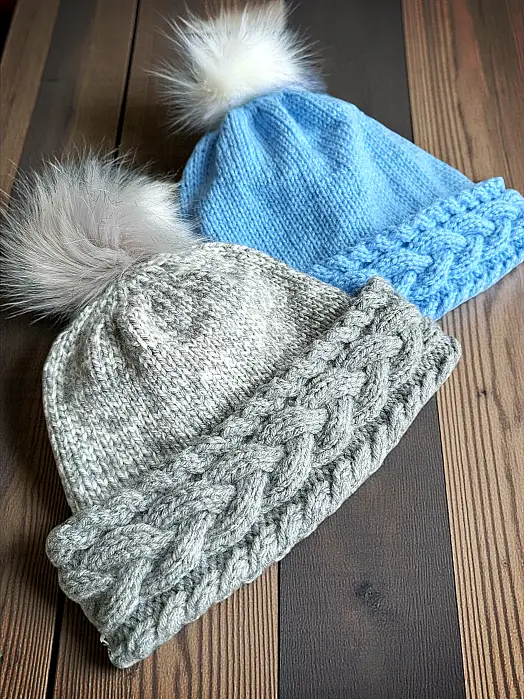 Hand knit cable beanie free knitting pattern laid flat winter hat with folded brim