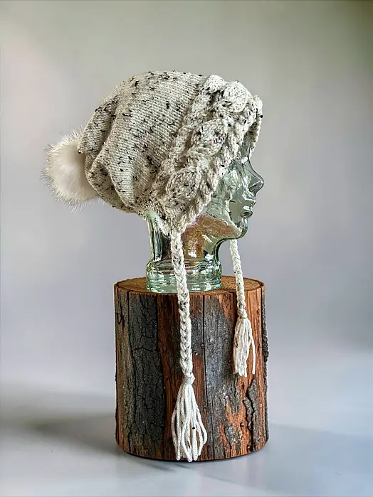 Cozy knitted hat echoing the gentle pattern of autumn leaves