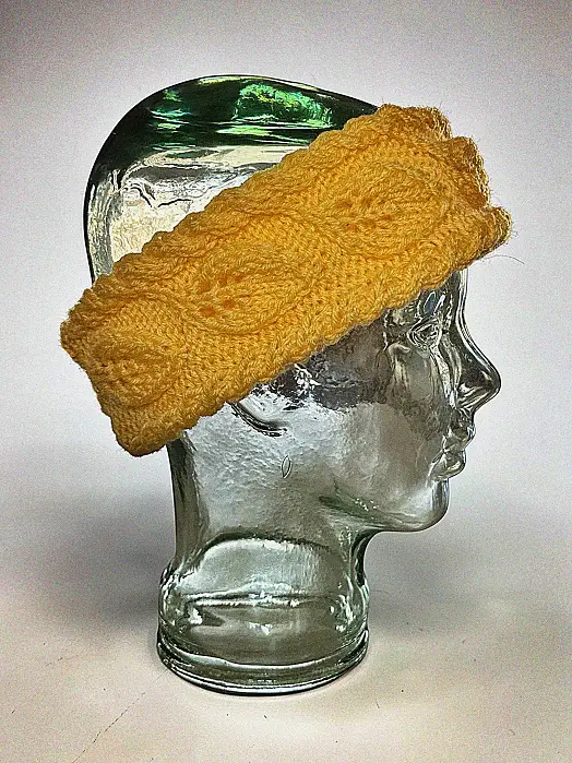Warm textured knit headband with leaf pattern ideal for cold weather ear warmer free knitting pattern