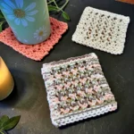 Beginner friendly knit dishcloth free pattern simple textured dishcloth flat lay handmade kitchen cloth