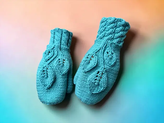 Knitted leaf mittens with three leaf motif and cable rib cuff