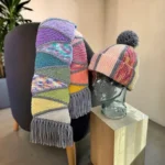 Free scrap yarn scarf and beanie knitting patterns displayed as a matching winter set