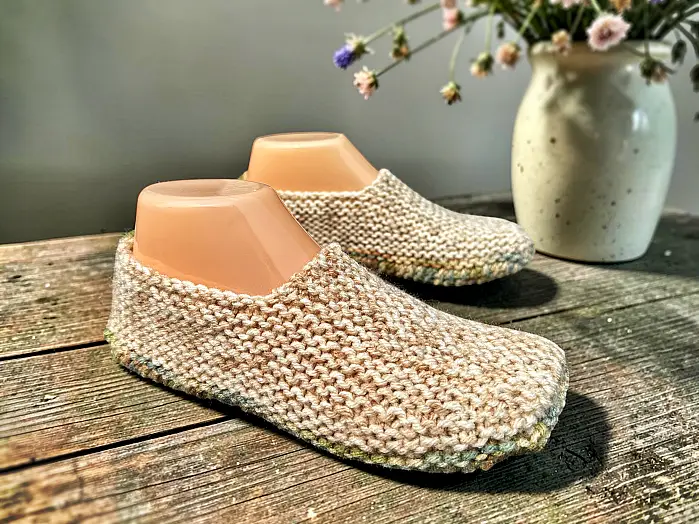 Easy knitted slippers for adults featuring a unique sideways short row design