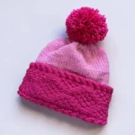 Beginner-friendly knitting pattern for a diamond brim beanie with video tutorials.