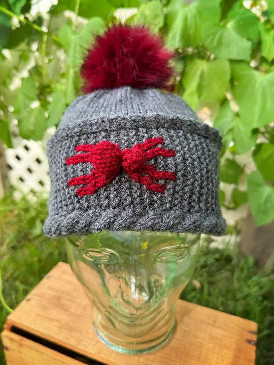 Halloween spider beanie knitted winter hat with bold spider colourwork free knitting pattern