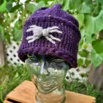Halloween-inspired spider beanie free knitting pattern