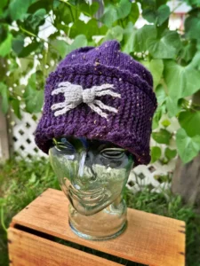 Halloween-inspired spider beanie free knitting pattern