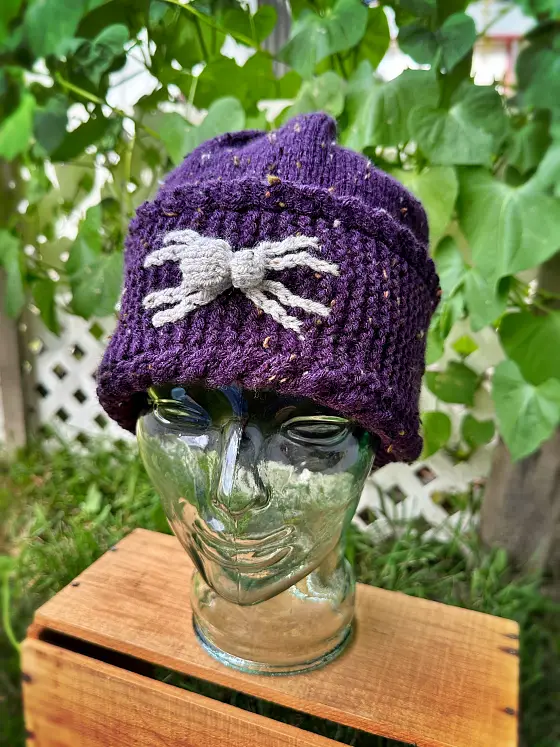 Halloween-inspired spider beanie free knitting pattern